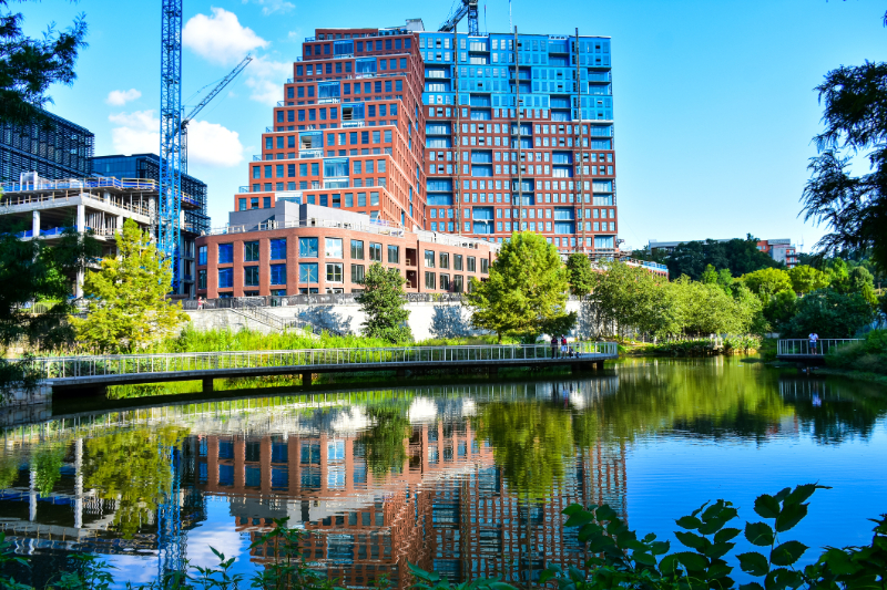 New condominium tower under construction near the park