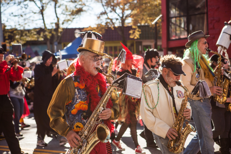 Saxophone players march with their band